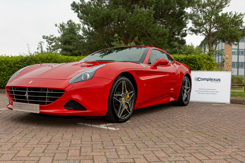 Side of a Complexus clients Ferrari with tracking device and immobiliser installed